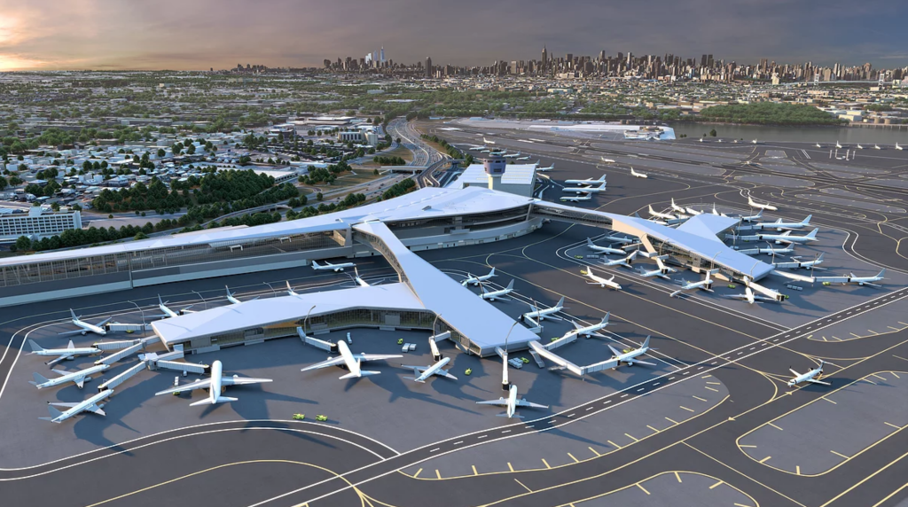 Modern airport with commercial airplanes and city skyline